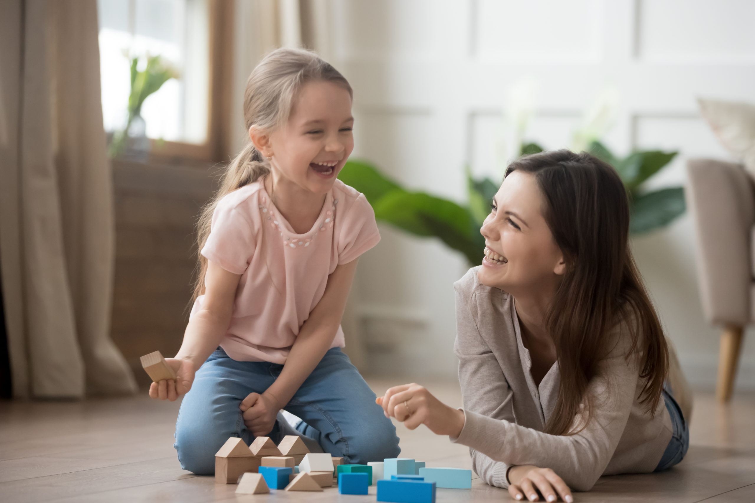 Happy,Family,Mom,Baby,Sitter,And,Little,Kid,Daughter,Laughing