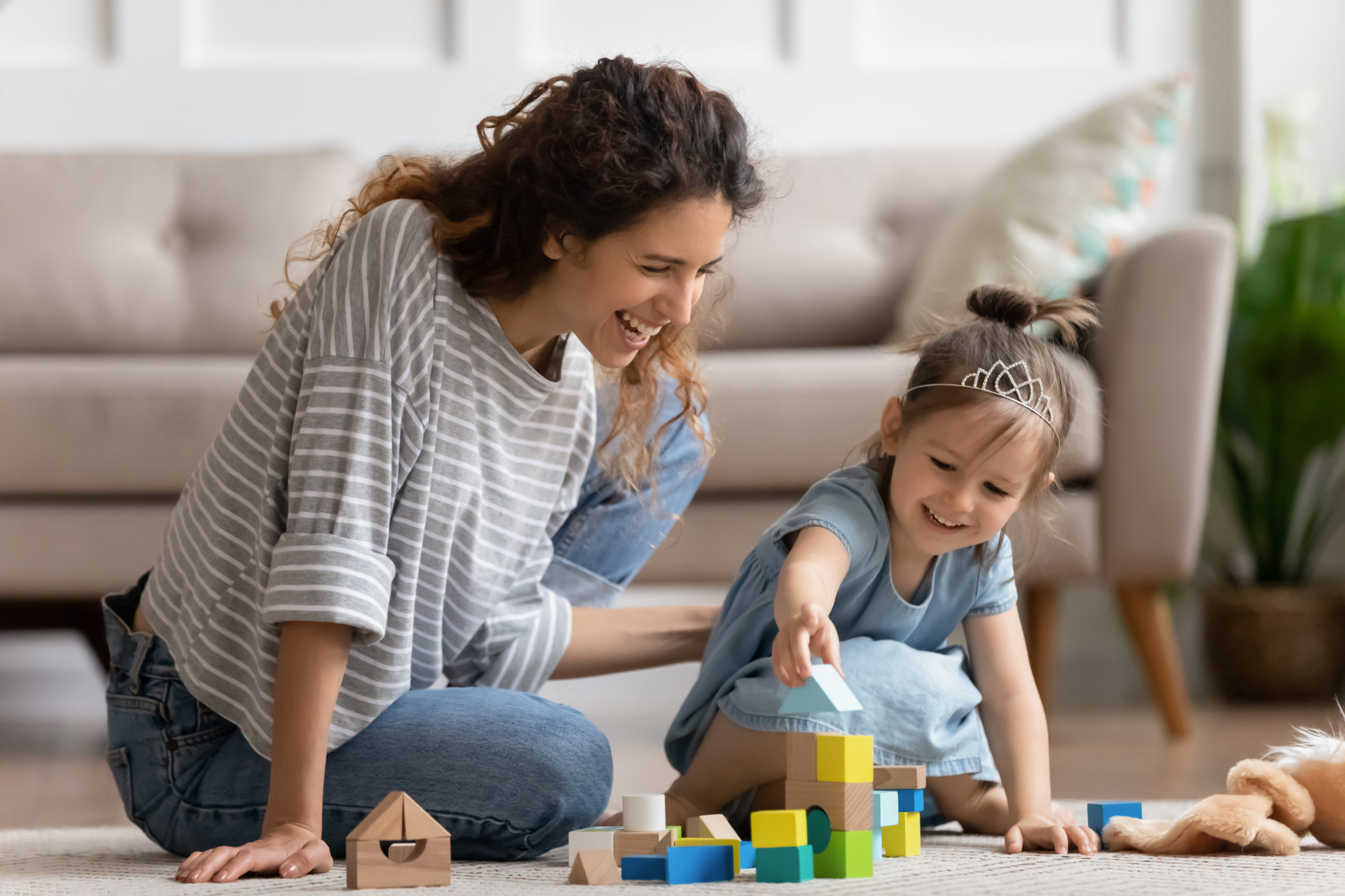 Laughing,Mother,And,Little,Daughter,Wearing,Princess,Diadem,Playing,Colorful