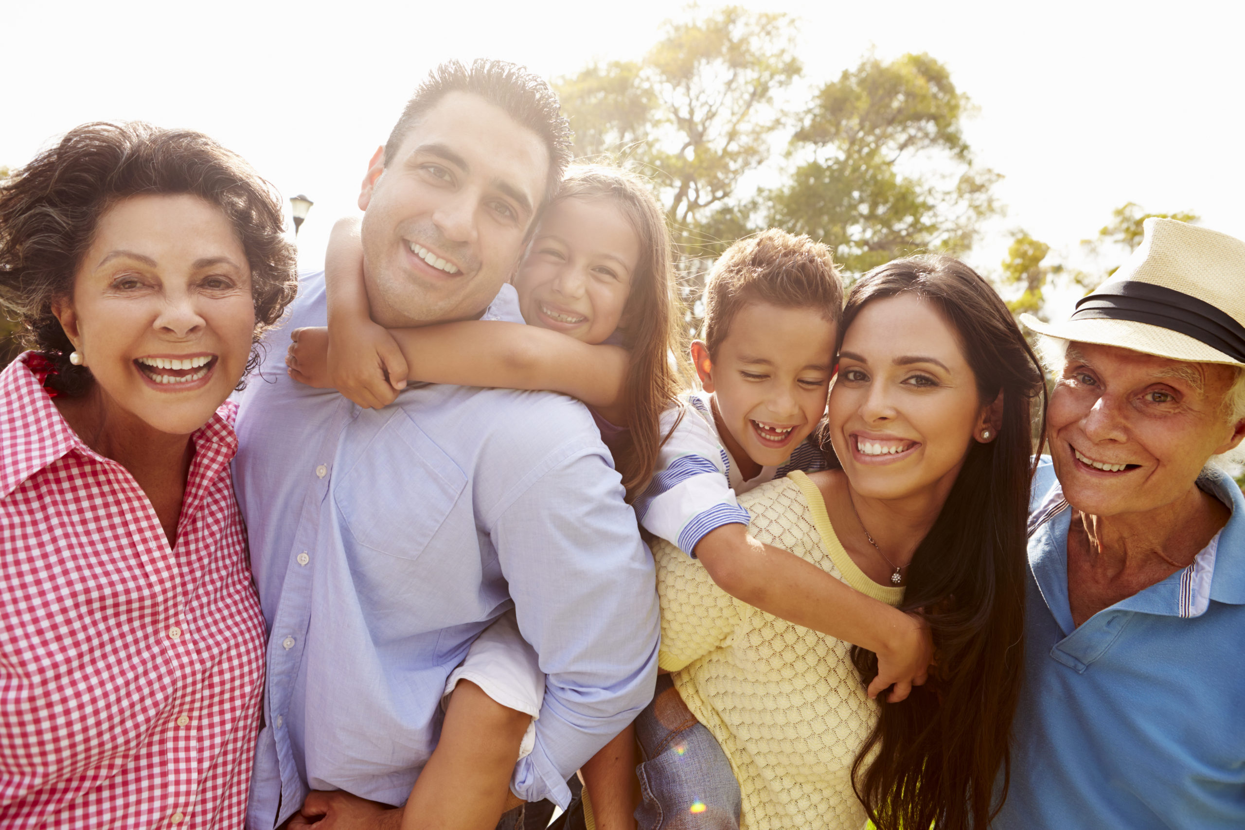 Multi,Generation,Family,Having,Fun,In,Garden,Together